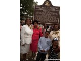 Families in front of Plaque